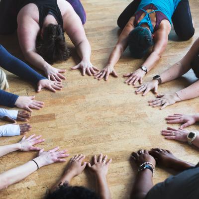 Group of women in a yoga stretch